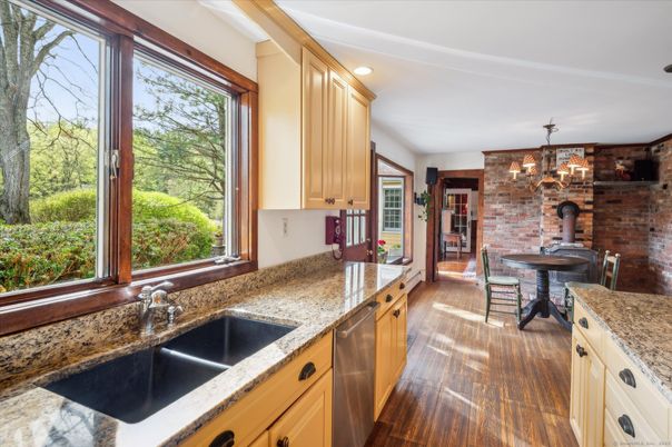 Chandelier, Dining room, Interior, Recessed Lighting, Stone Walls, Wood Texture Flooring