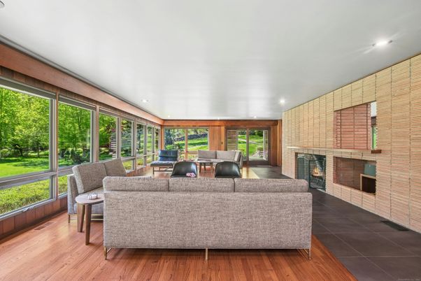 Fireplace, Interior, Living room, Recessed Lighting, Stone Walls, Wood Texture Flooring