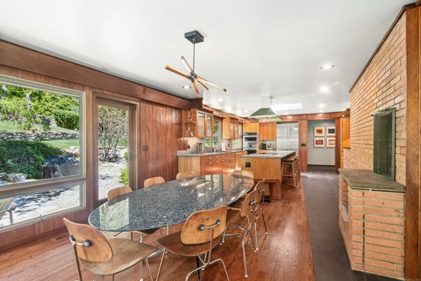 Dining room, Interior, Kitchen, Pendant Lights, Recessed Lighting, Stainless Steel Appliances, Stone Walls, Wood Texture Flooring