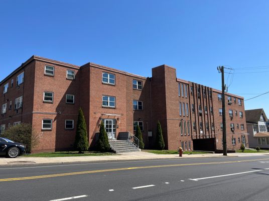 Exterior, Facade, Brick Facade, Condo Building