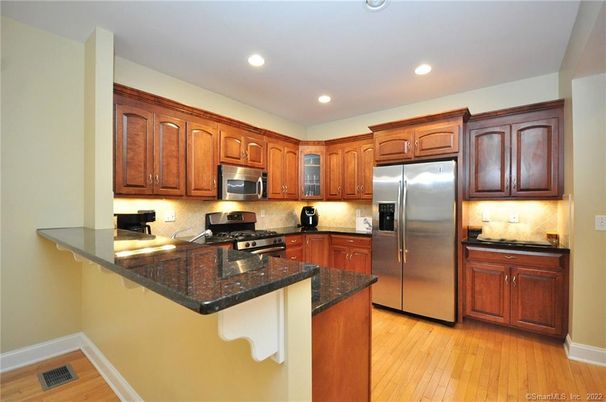 Interior, Kitchen, Recessed Lighting, Stainless Steel Appliances, Wood Texture Flooring
