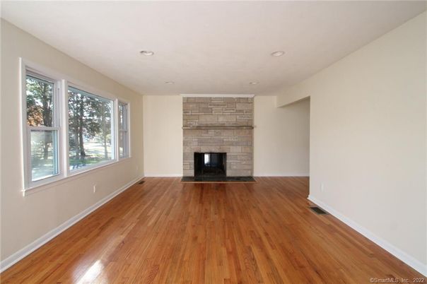 Empty room, Fireplace, Interior, Recessed Lighting, Wood Texture Flooring