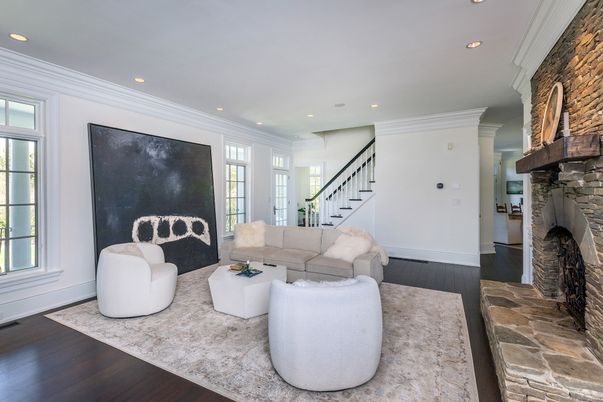 Fireplace, Interior, Living room, Recessed Lighting, Stone Walls, Wood Texture Flooring