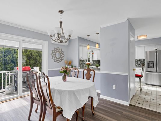 Chandelier, Dining room, Interior, Kitchen, Pendant Lights, Stainless Steel Appliances, Wood Texture Flooring