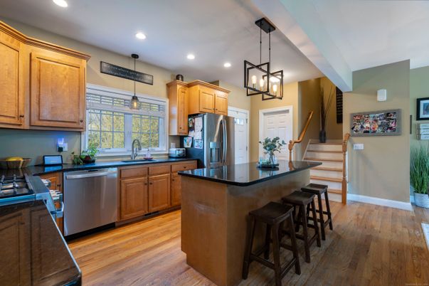 Interior, Kitchen, Pendant Lights, Recessed Lighting, Stainless Steel Appliances, Wood Texture Flooring