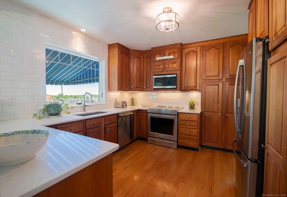 Interior, Kitchen, Recessed Lighting, Stainless Steel Appliances, Wood Texture Flooring