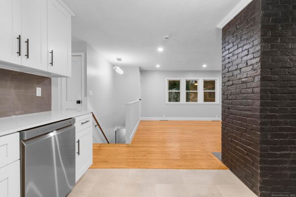 Interior, Kitchen, Recessed Lighting, Stainless Steel Appliances, Stone Walls, Wood Texture Flooring