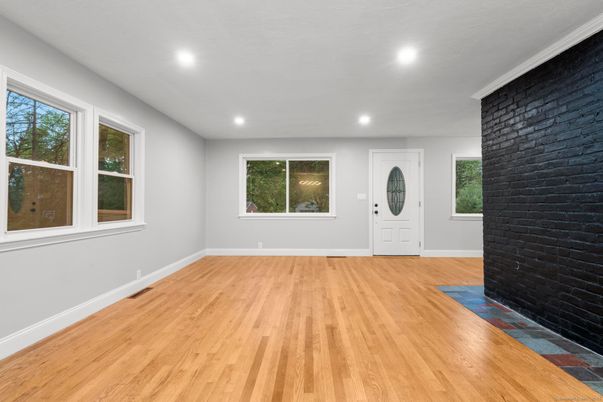Empty room, Fireplace, Interior, Recessed Lighting, Wood Texture Flooring