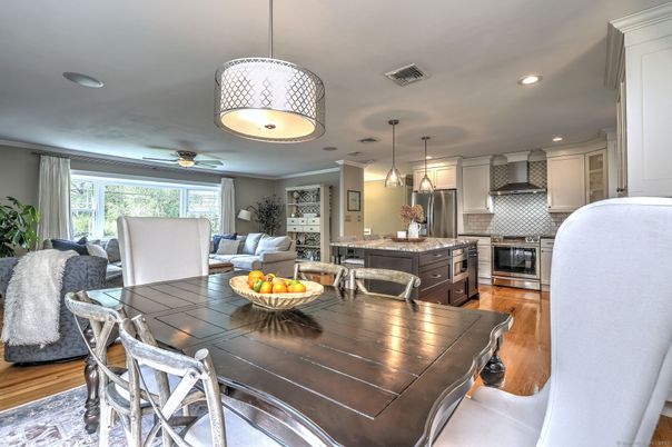 Dining room, Interior, Kitchen, Living room, Pendant Lights, Recessed Lighting, Stainless Steel Appliances, Wood Texture Flooring