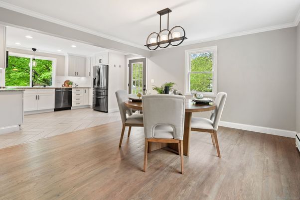 Chandelier, Dining room, Interior, Kitchen, Recessed Lighting, Stainless Steel Appliances, Wood Texture Flooring
