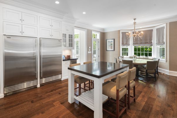 Chandelier, Dining room, Interior, Kitchen, Recessed Lighting, Stainless Steel Appliances, Wood Texture Flooring