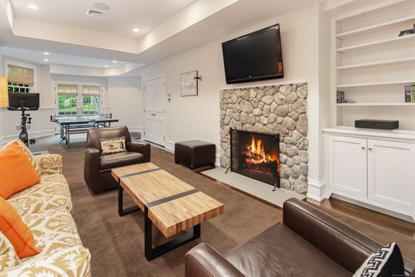 Billiard Table, Fireplace, Game Room, Interior, Living room, Recessed Lighting, Wood Texture Flooring