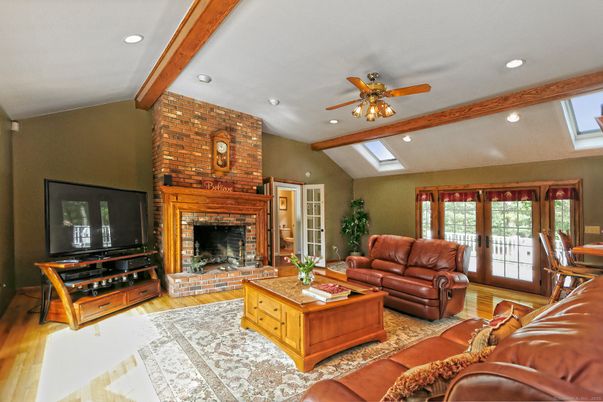 Fireplace, Interior, Living room, Recessed Lighting, Stone Walls, Wooden Beams, Wood Texture Flooring