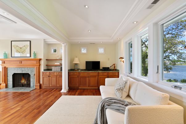 Fireplace, Interior, Living room, Recessed Lighting, Water, Wood Texture Flooring
