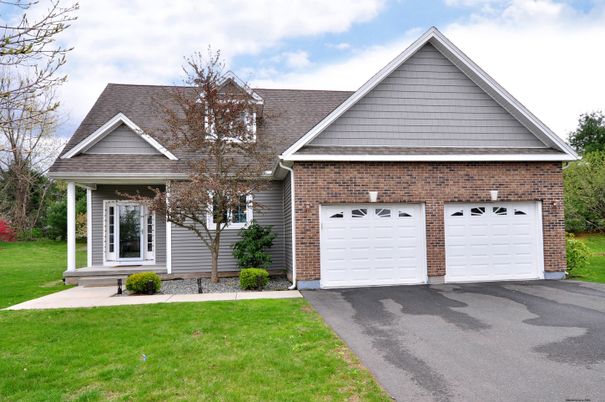 Attached, Exterior, Facade, Brick Facade, Brick Traditional