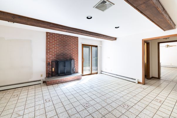 Empty room, Fireplace, Interior, Recessed Lighting, Stone Walls