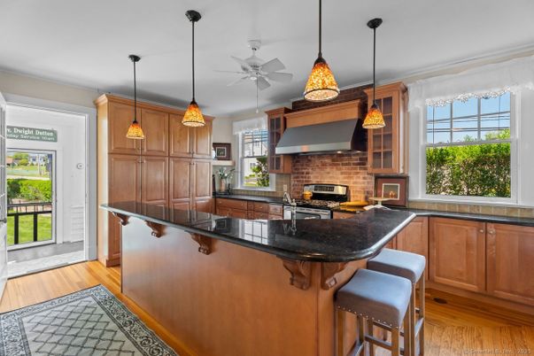 Fireplace, Interior, Kitchen, Pendant Lights, Recessed Lighting, Stone Walls, Wood Texture Flooring