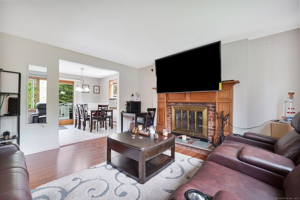 Dining room, Fireplace, Interior, Living room, Pendant Lights, Wood Texture Flooring