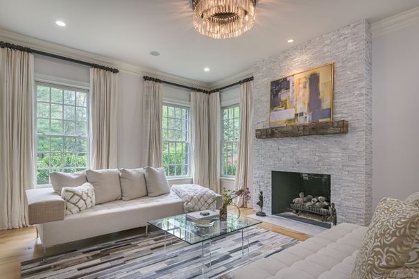 Fireplace, Interior, Living room, Recessed Lighting, Stone Walls, Wood Texture Flooring