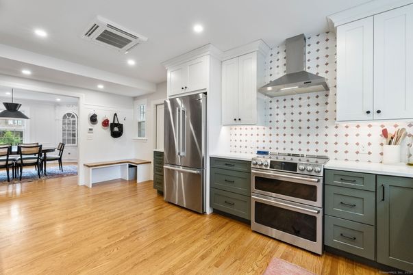 Dining room, Interior, Kitchen, Pendant Lights, Recessed Lighting, Stainless Steel Appliances, Wood Texture Flooring