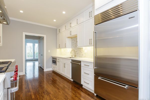 Interior, Kitchen, Recessed Lighting, Stainless Steel Appliances, Wood Texture Flooring