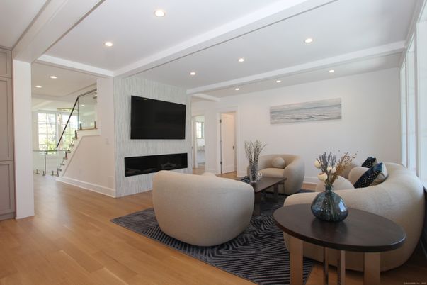 Fireplace, Interior, Living room, Recessed Lighting, Wood Texture Flooring