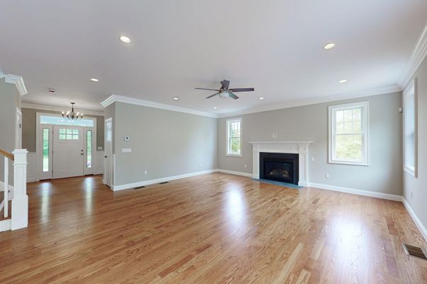 Chandelier, Empty room, Fireplace, Interior, Recessed Lighting, Wood Texture Flooring