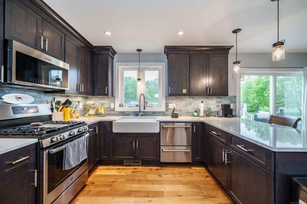 Interior, Kitchen, Pendant Lights, Recessed Lighting, Stainless Steel Appliances, Wood Texture Flooring