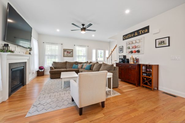 Fireplace, Interior, Living room, Recessed Lighting, Wood Texture Flooring