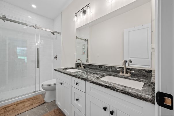 Bathroom, Dual Sink Vanities, Glass Shower, Interior, Recessed Lighting