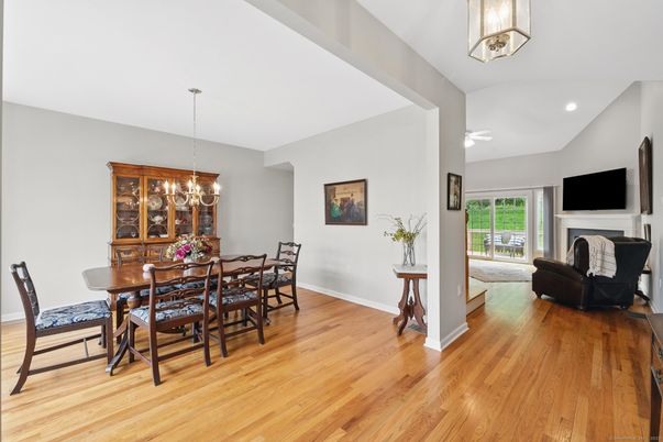 Chandelier, Dining room, Fireplace, Interior, Recessed Lighting, Wood Texture Flooring