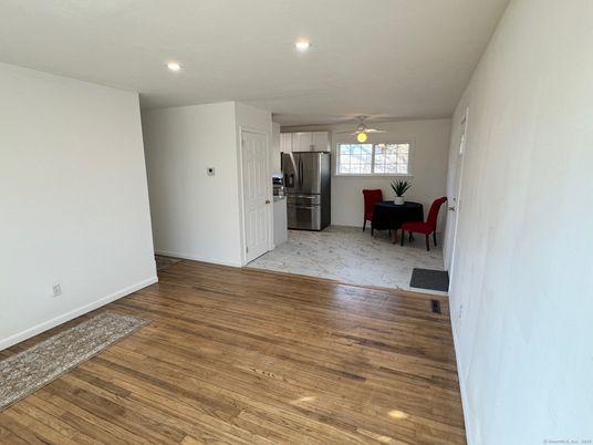 Dining room, Interior, Kitchen, Recessed Lighting, Stainless Steel Appliances, Wood Texture Flooring