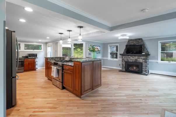 Fireplace, Interior, Kitchen, Pendant Lights, Recessed Lighting, Wood Texture Flooring