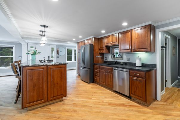 Dining room, Interior, Kitchen, Pendant Lights, Recessed Lighting, Stainless Steel Appliances, Wood Texture Flooring