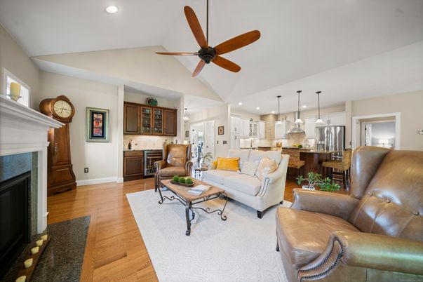 Fireplace, Interior, Kitchen, Living room, Pendant Lights, Recessed Lighting, Stainless Steel Appliances, Wood Texture Flooring