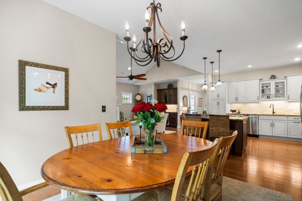 Chandelier, Dining room, Interior, Kitchen, Pendant Lights, Recessed Lighting, Stainless Steel Appliances, Wood Texture Flooring