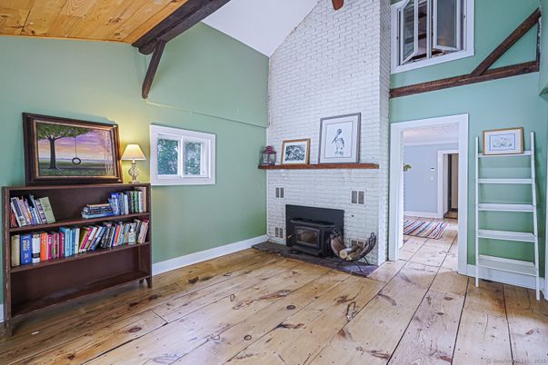 Empty room, Fireplace, Interior, Stone Walls, Wooden Beams, Wooden Ceilings, Wood Texture Flooring