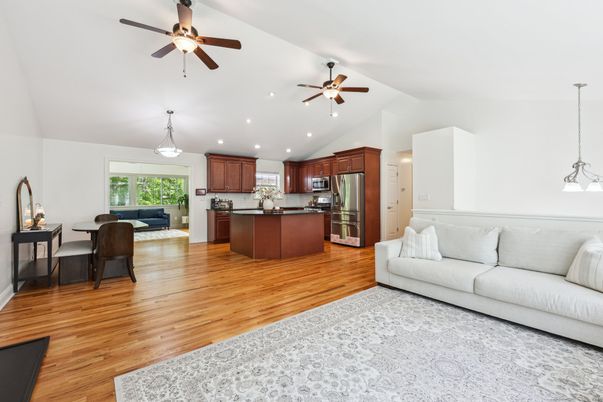 Chandelier, Interior, Kitchen, Living room, Pendant Lights, Recessed Lighting, Stainless Steel Appliances, Wood Texture Flooring