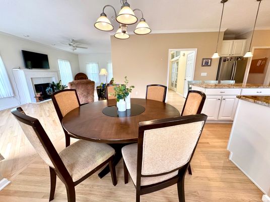 Dining room, Fireplace, Interior, Pendant Lights, Wood Texture Flooring