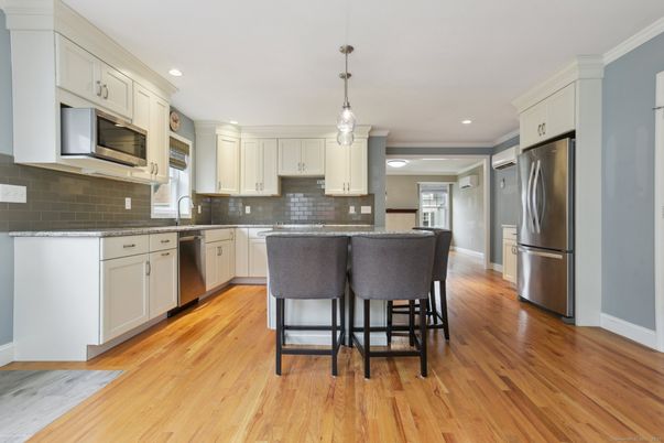 Interior, Kitchen, Pendant Lights, Recessed Lighting, Stainless Steel Appliances, Wood Texture Flooring