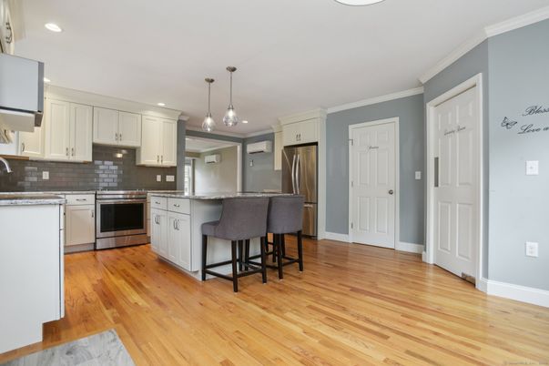 Interior, Kitchen, Pendant Lights, Recessed Lighting, Stainless Steel Appliances, Wood Texture Flooring