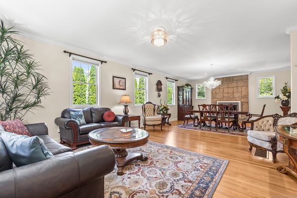 Chandelier, Dining room, Fireplace, Interior, Living room, Stone Walls, Wood Texture Flooring