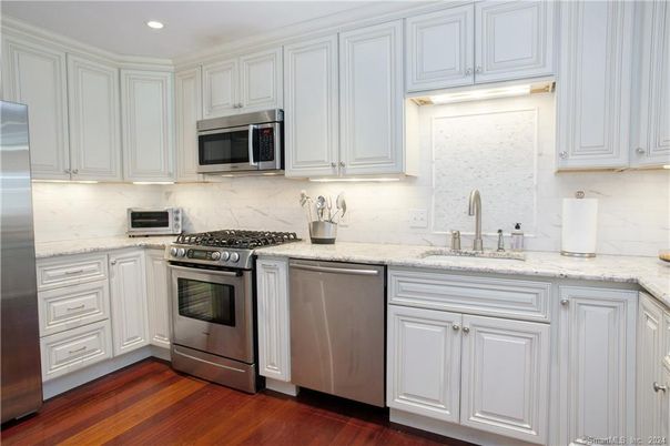 Interior, Kitchen, Recessed Lighting, Stainless Steel Appliances, Wood Texture Flooring