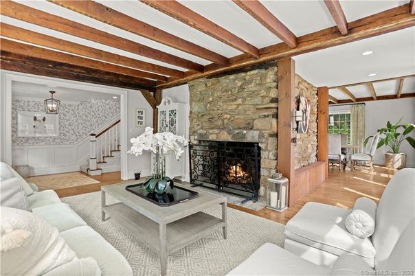 Fireplace, Interior, Living room, Pendant Lights, Recessed Lighting, Stone Walls, Wooden Beams, Wood Texture Flooring
