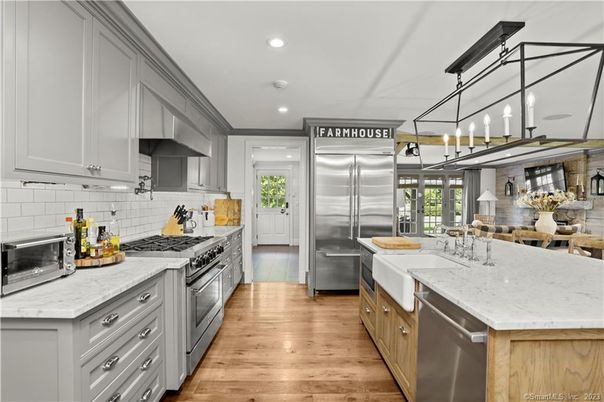 Dining room, Interior, Kitchen, Recessed Lighting, Stainless Steel Appliances, Wood Texture Flooring