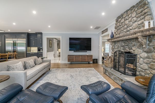 Fireplace, Interior, Kitchen, Living room, Recessed Lighting, Stainless Steel Appliances, Stone Walls, Wood Texture Flooring