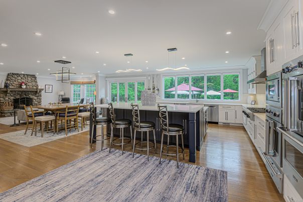 Dining room, Fireplace, Interior, Kitchen, Pendant Lights, Recessed Lighting, Stainless Steel Appliances, Wood Texture Flooring