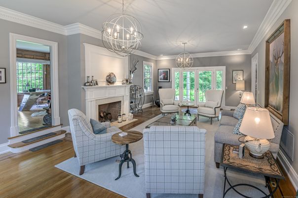 Chandelier, Fireplace, Interior, Living room, Recessed Lighting, Wood Texture Flooring