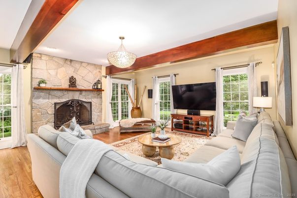 Chandelier, Fireplace, Interior, Living room, Stone Walls, Wood Texture Flooring