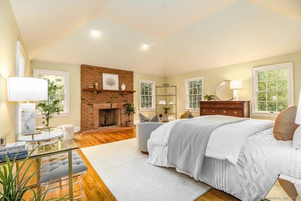 Bedroom, Fireplace, Interior, Recessed Lighting, Stone Walls, Wood Texture Flooring